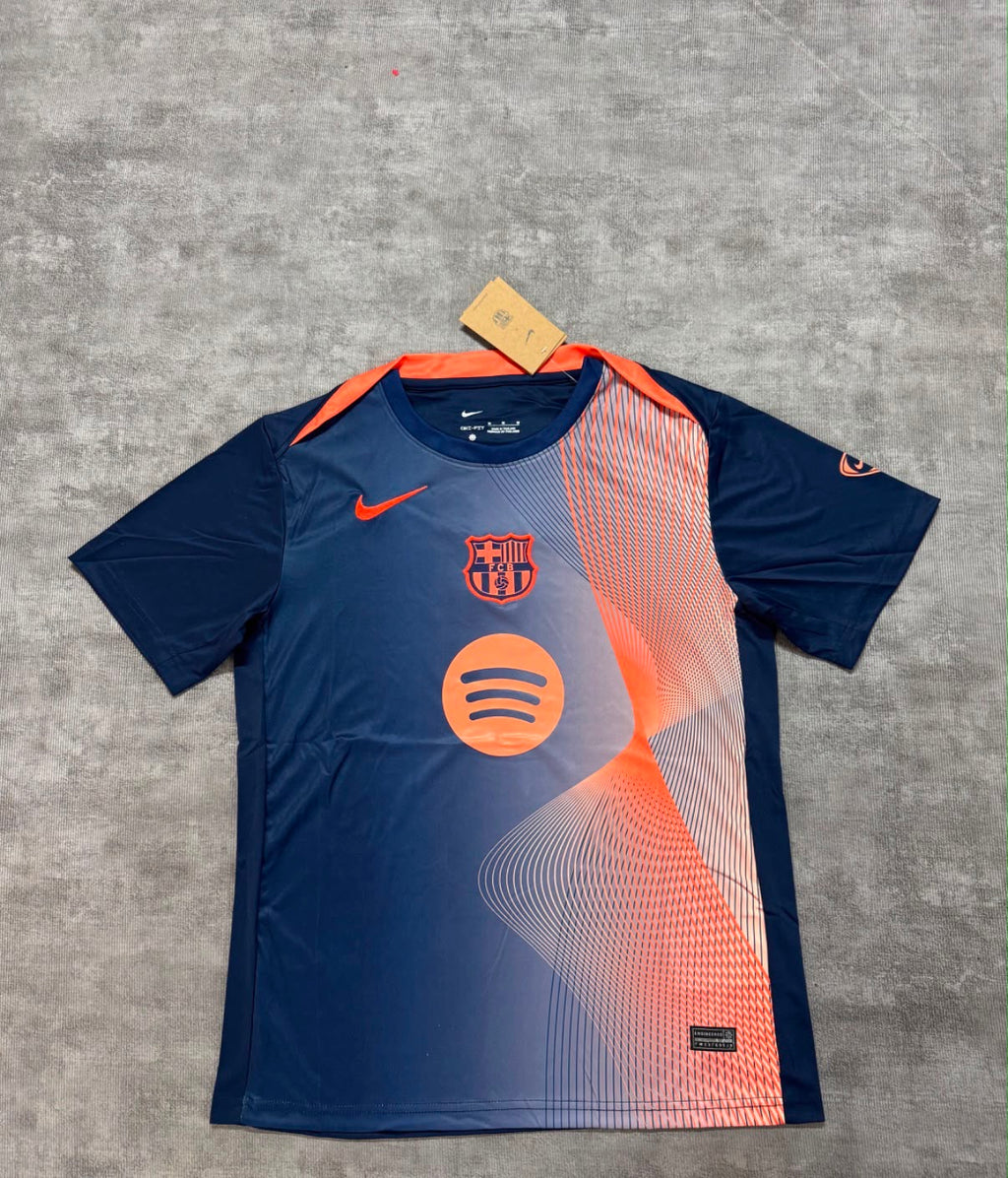Maillot pré-match FC Barcelona 25/26 Third T90 bleu marine et orange - face