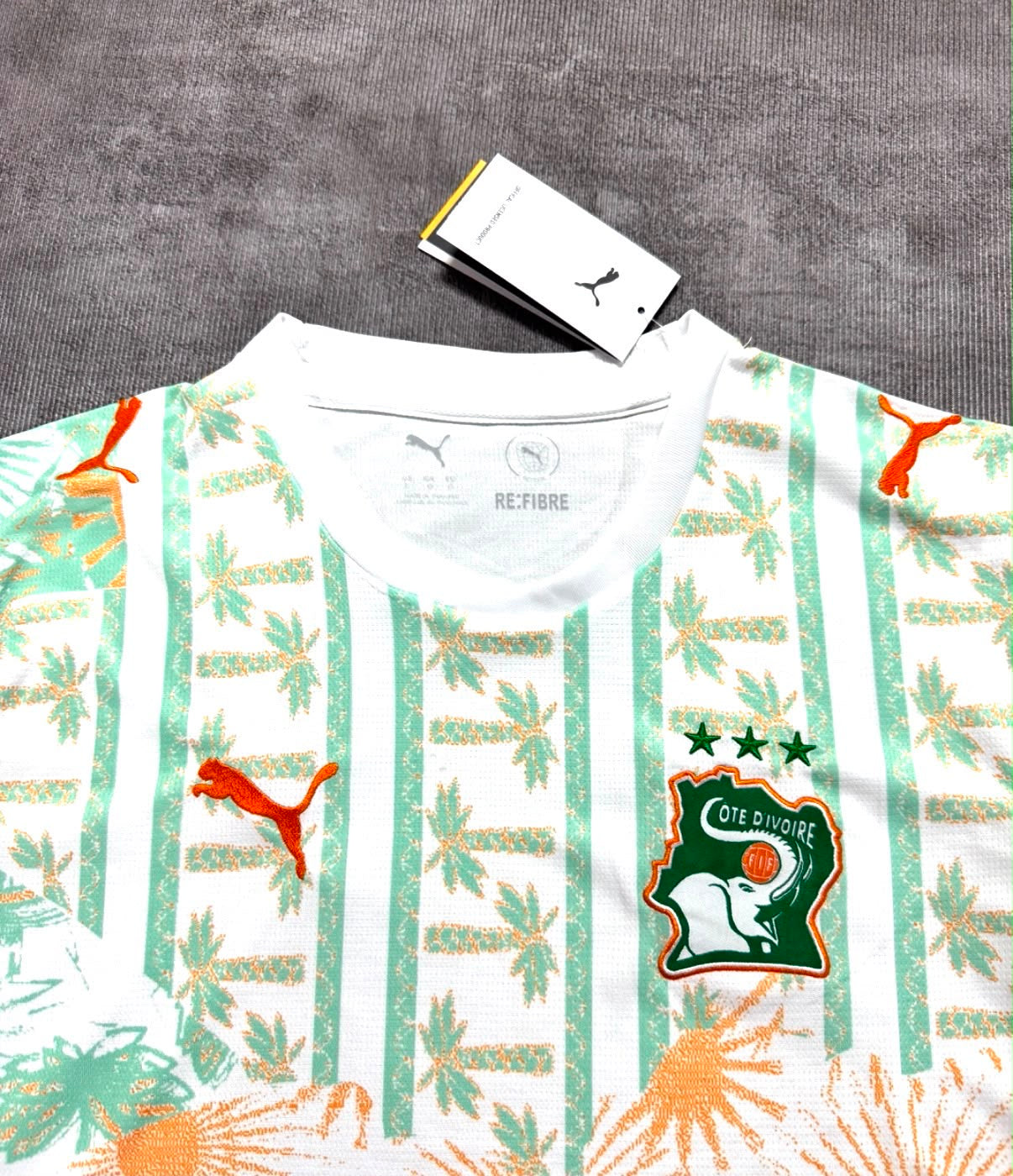 Détail maillot extérieur Côte d'Ivoire 2026 blanc vert orange