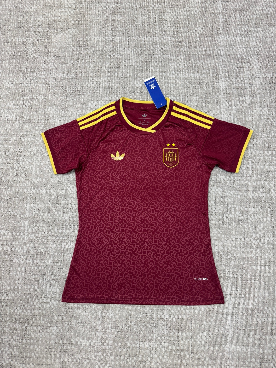 Maillot Espagne bordeaux et jaune - vue de face