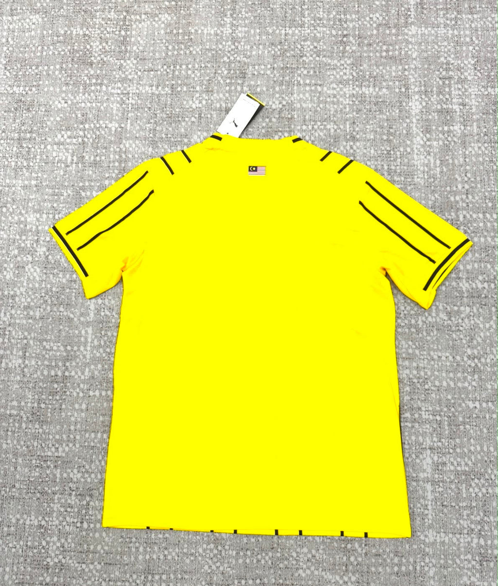Malaisie maillot jaune et noir vue de dos
