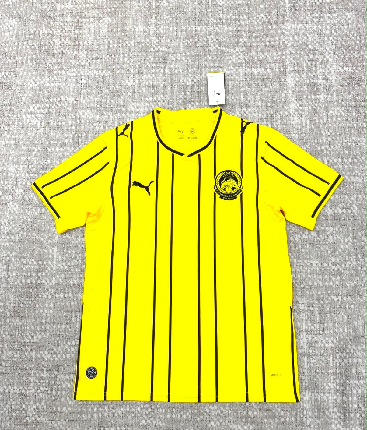 Malaisie maillot jaune et noir vue de face
