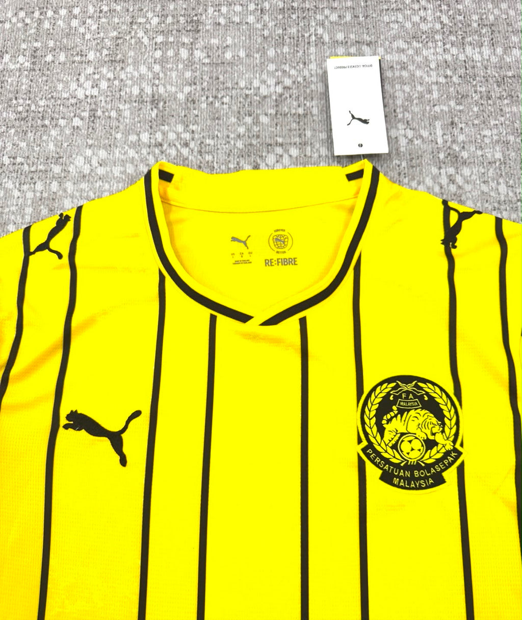 Malaisie maillot domicile jaune et noir détail