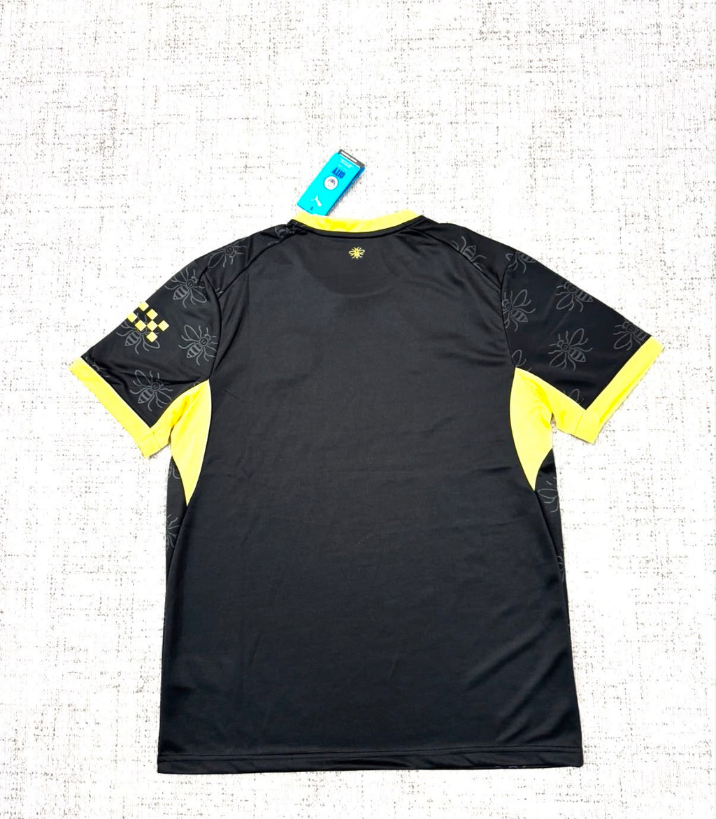 Maillot extérieur Manchester City 2026/27 noir et jaune vue de dos