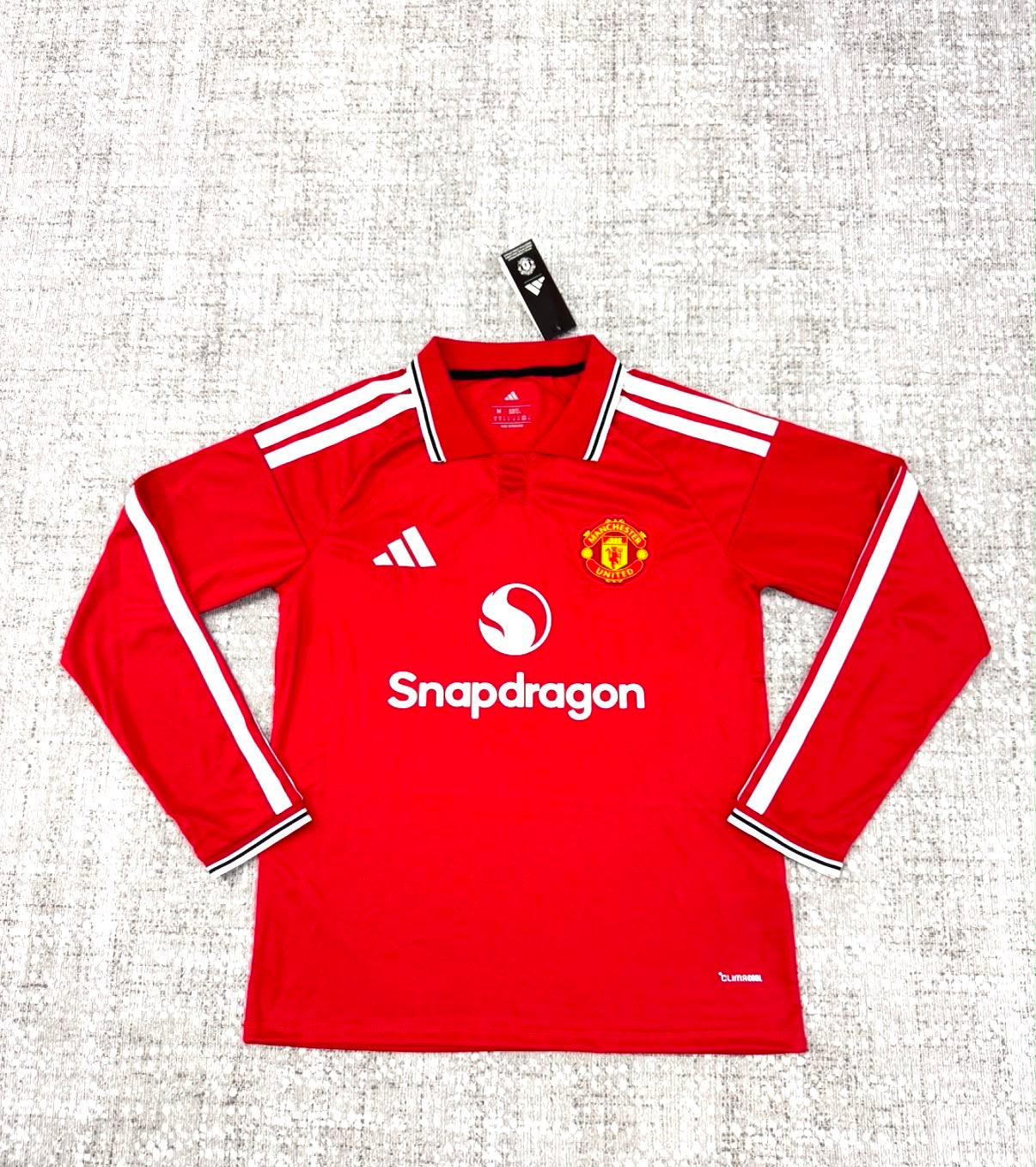 Maillot Manchester United domicile 2026/27 manches longues adulte vue de face