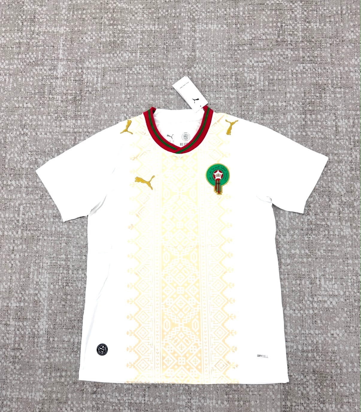 Maroc maillot blanc et or détail face