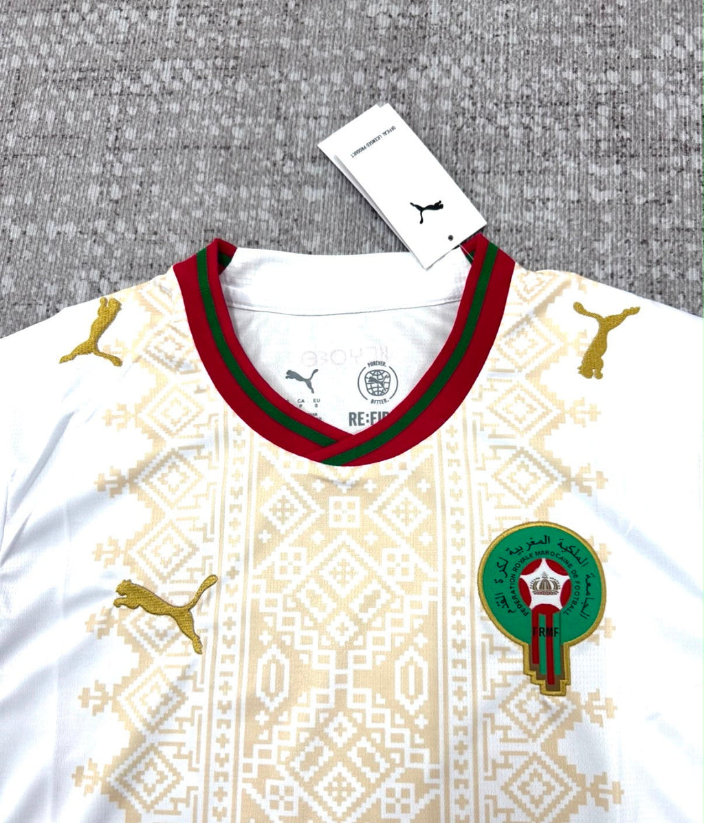 Maroc maillot blanc et or détail face