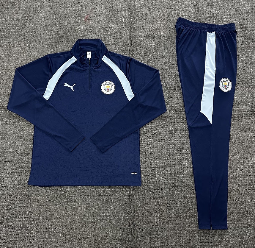 Survêtement Manchester City bleu marine et bleu ciel